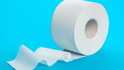 Toilet Paper on Blue Background
